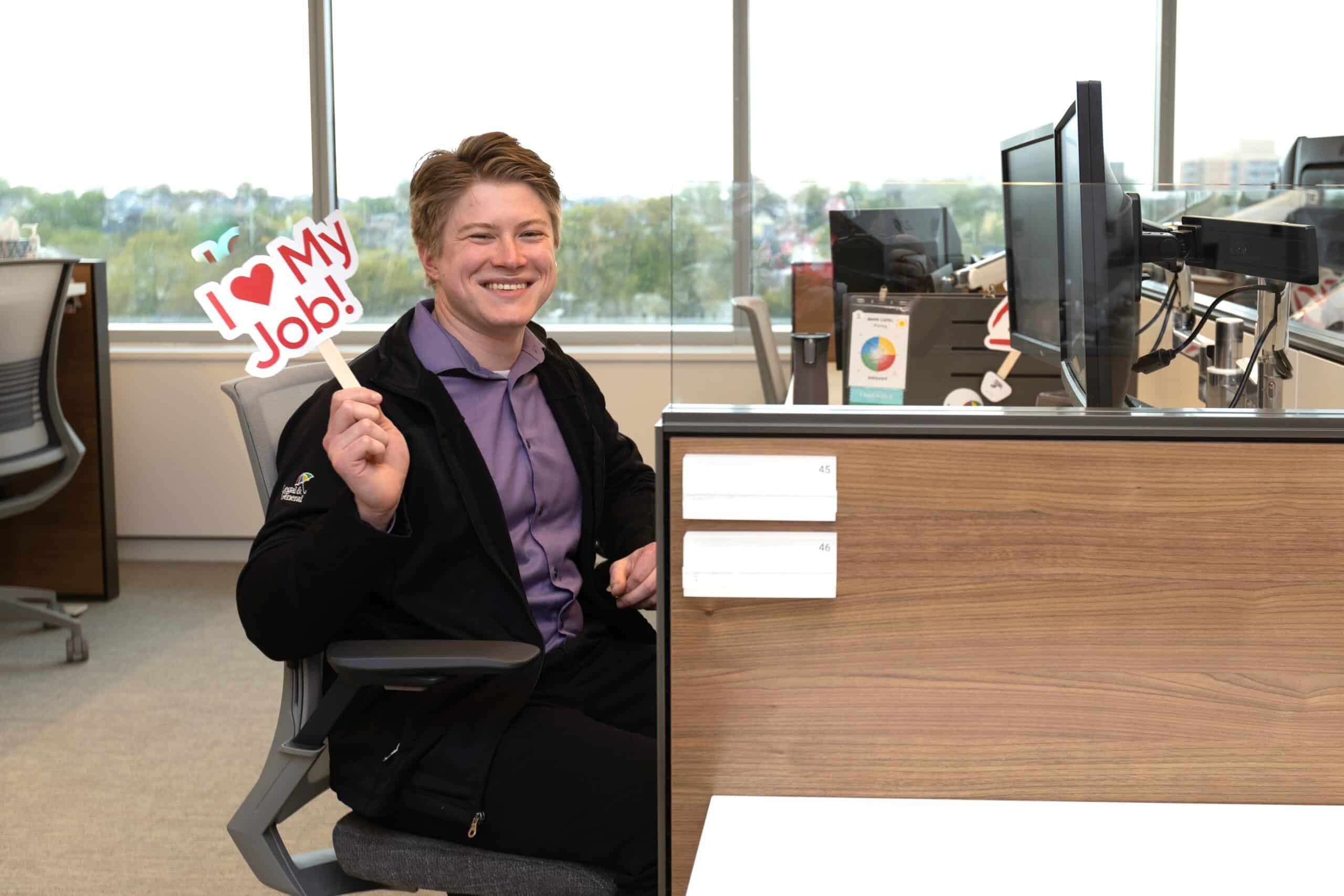 Smiling woman outside of an office building