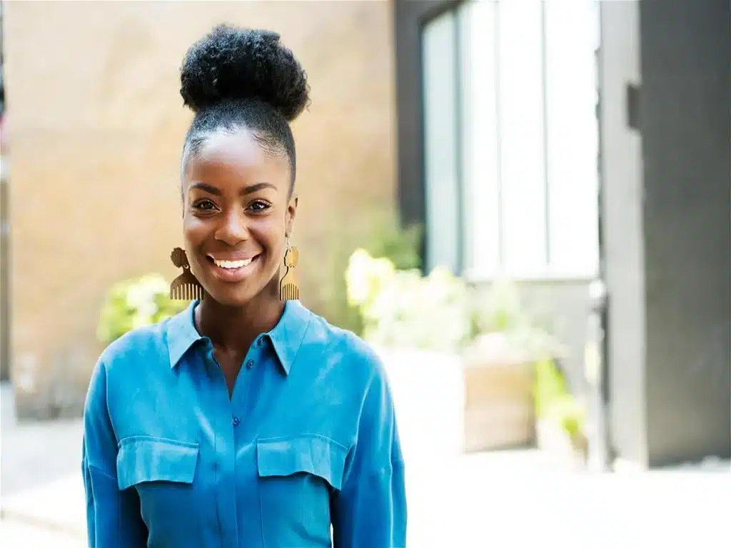 Smiling woman outside of an office building